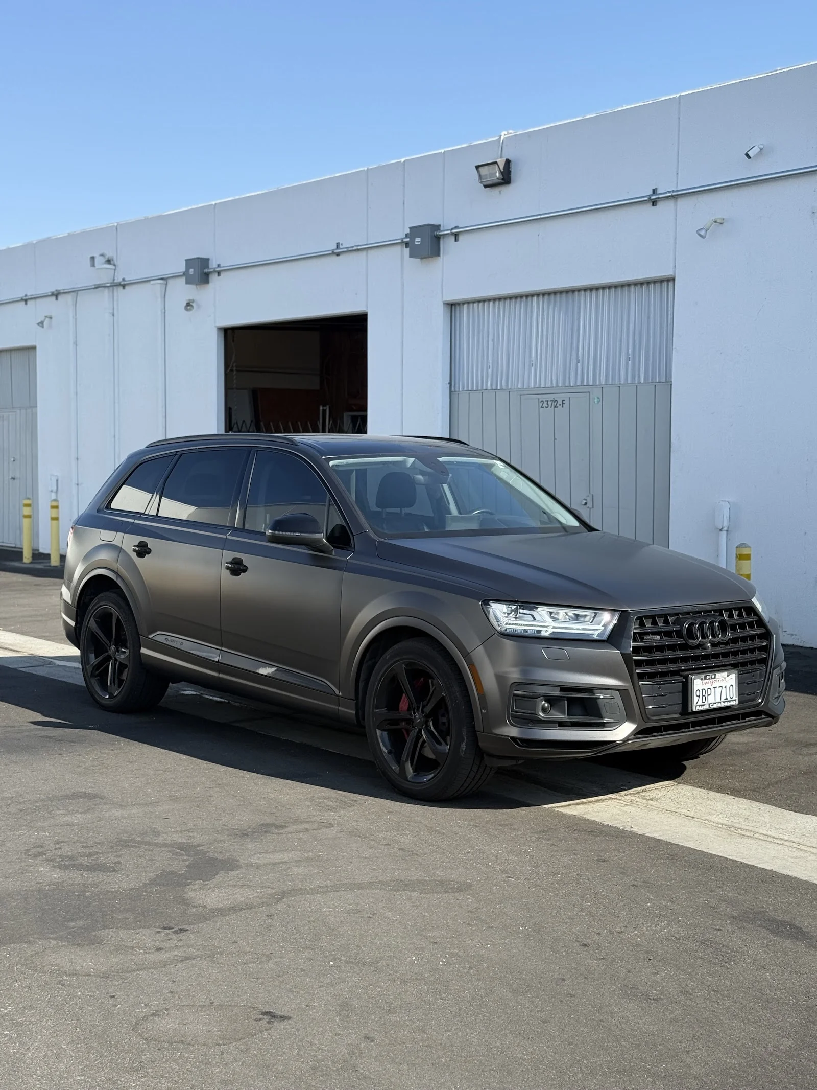 Matte-wrapped Audi Q7 at Ace of Spades Customs in Orange, CA
